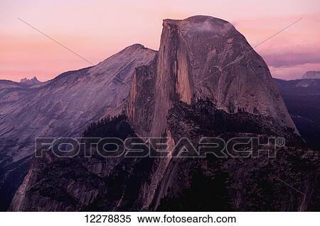 Sunset on Half Dome as seen from Glacier Point, Yosemite National Park; California, United States of America View Large Photo Image Stock Photography - Sunset on Half Dome as seen from Glacier Point, Yosemite National Park; California, United States of America. Fotosearch