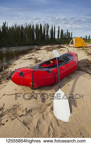 Tent and packraft on sandy beach on the Charley River, YukonCharley Rivers National Preserve; Alaska, United States of America View Large Photo Image Stock Photograph - Tent and packraft on sandy beach on the Charley River, YukonCharley Rivers National Preserve; Alaska, United States of America. Fotosearch
