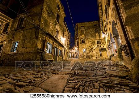 Stock Photograph - The picturesque Medieval town given over to artists known as Groznjan at night; Groznjan, Istria, Croatia. Fotosearch