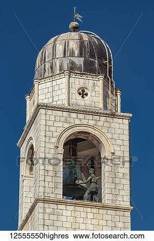 Stock Photograph - The Zelenci, or The Greens Maro and Baro on top of the City Bell Tower; Dubrovnik, Dubrovnik-Neretva County, Croatia. Fotosearch