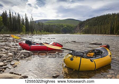 Two pack rafts rest on shore on the Charley River in summer, YukonCharley Rivers National Preserve; Alaska, United States of America View Large Photo Image Stock Photograph - Two pack rafts rest on shore on the Charley River in summer, YukonCharley Rivers National Preserve; Alaska, United States of America. Fotosearch
