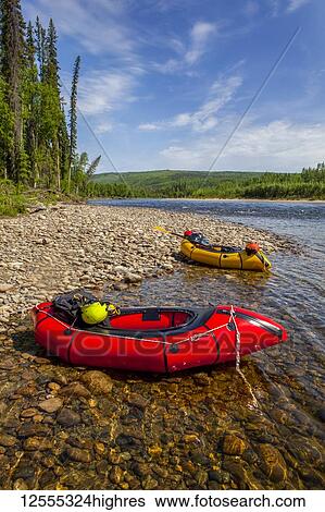 Two pack rafts rest on shore on the Charley River in summer, YukonCharley Rivers National Preserve; Alaska, United States of America View Large Photo Image Stock Photograph - Two pack rafts rest on shore on the Charley River in summer, YukonCharley Rivers National Preserve; Alaska, United States of America. Fotosearch