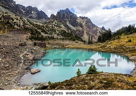 Stock Photograph - Upper Royal Basin with The Needles and Mt. Clark in the background, Olympic Mountains, Olympic National Park; Washington, United States of America. Fotosearch