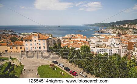 Stock Photograph - View of the Adriatic Sea from a rooftop; Trieste, Friuli Venezia Giulia, Italy. Fotosearch
