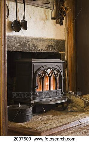 View Of The Fireplace In The Kitchen Of An Old Canadiana Circa