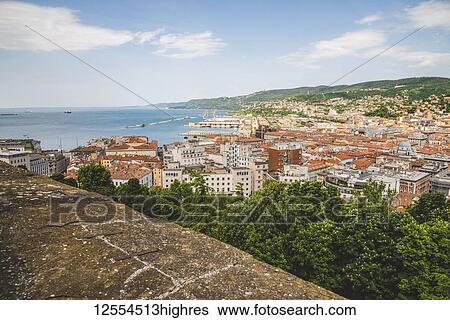 Stock Photograph - View of Trieste and the Adriatic Sea from a rooftop; Trieste, Friuli Venezia Giulia, Italy. Fotosearch