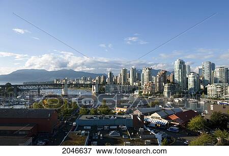 Stock Photo - View Over Granville Island, False Creek, To West End And Burrard Street Bridge, Vancouver, British Columbia. Fotosearch