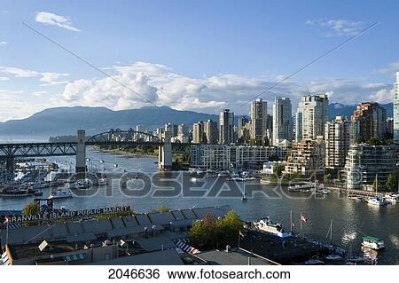 Stock Photograph - View Over Granville Island, False Creek, To West End And Burrard Street Bridge, Vancouver, British Columbia. Fotosearch