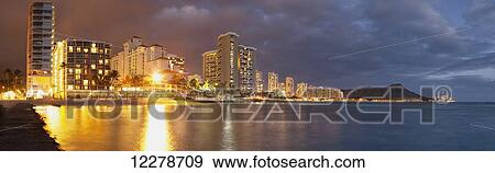 Stock Photo - Waikiki Beach just after sunset; Honolulu, Oahu, Hawaii, United States of America. Fotosearch