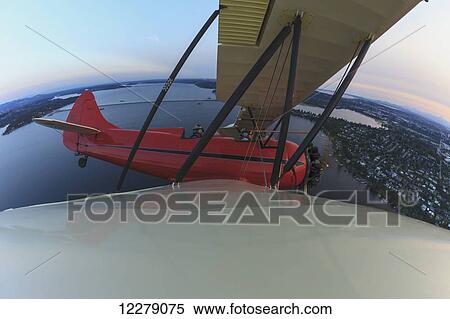Wingtip view of Waco UPF-7 biplane; Puget Sound, Washington, United States of America View Large Photo Image Stock Photography - Wingtip view of Waco UPF-7 biplane; Puget Sound, Washington, United States of America. Fotosearch