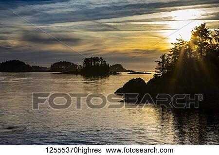 Stock Photograph - Winter sunset looking over Crescent Bay; Sitka, Alaska, United States of America. Fotosearch