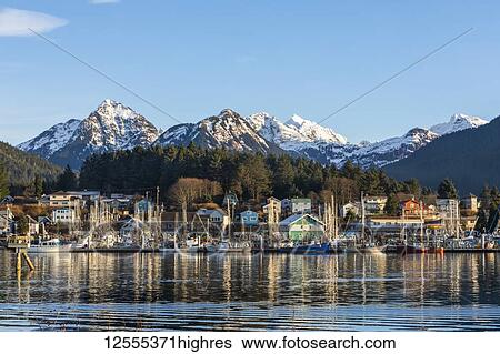 Stock Photograph - Winter view of Sitka Harbour with Gavan Hill and The Sisters mountains in background; Sitka, Alaska, United States of America. Fotosearch