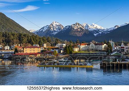 Stock Photograph - Winter view of Sitka Harbour with Gavan Hill and The Sisters mountains in background; Sitka, Alaska, United States of America. Fotosearch
