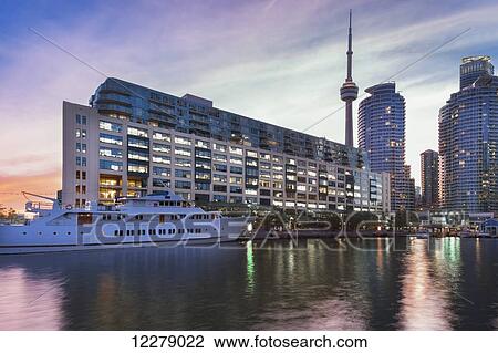 Stock Image - Yacht moored at Queens Quay at Harbourfront; Toronto, Ontario, Canada. Fotosearch