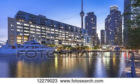 Yacht moored at Queens Quay at Harbourfront; Toronto, Ontario, Canada View Large Photo Image Stock Image - Yacht moored at Queens Quay at Harbourfront; Toronto, Ontario, Canada. Fotosearch
