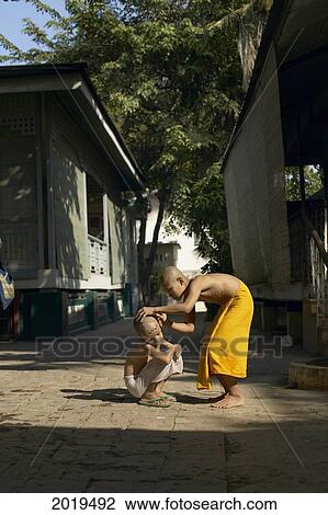Young Monk Shaving Another's Head, Mandalay, Myanmar (Burma) View Large Photo Image Stock Image - Young Monk Shaving Another's Head, Mandalay, Myanmar (Burma). Fotosearch