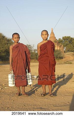Stock Image - Young Monks, Bagan, Myanmar (Burma). Fotosearch