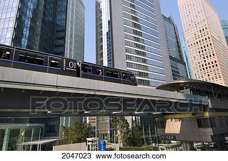 Stock Image - Yurikamone Sen Elevated Train Line From Shimbashi To Tokyo Bay, Tokyo, Japan. Fotosearch