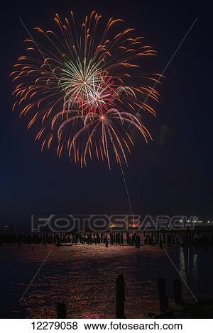A fireworks display celebrates July 4th; Astoria, Oregon, United States of America View Large Photo Image Stock Photo - A fireworks display celebrates July 4th; Astoria, Oregon, United States of America. Fotosearch