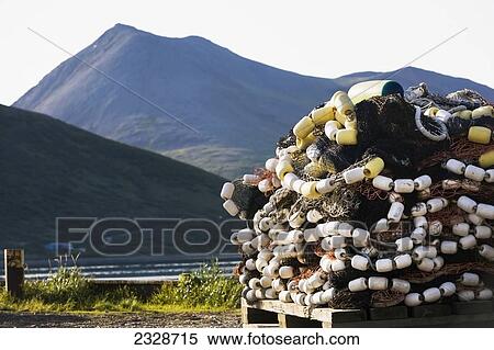 Stock Photography - A Salmon Seine Stored On Pallets In The Port Of King Cove In Summertime, Alaska Peninsula; Southwest Alaska, United States Of America. Fotosearch