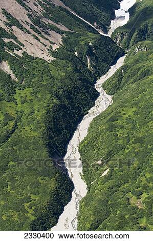 Stock Image - Aerial View Of Mount Douglas And Surrounding Mountain Peaks And Glaciers, Katmai Naional Park; Southwest Alaska, United States Of America. Fotosearch