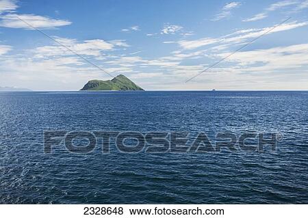 Amagat Island In Morzhovoi Bay On The Alaska Peninsula, With Umga Island In The Distance In The Summer; Southwest Alaska, United States Of America View Large Photo Image Stock Photo - Amagat Island In Morzhovoi Bay On The Alaska Peninsula, With Umga Island In The Distance In The Summer; Southwest Alaska, United States Of America. Fotosearch
