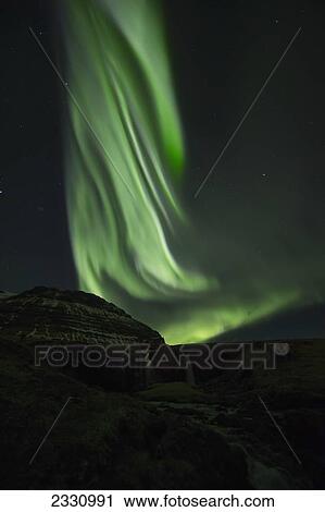 Stock Image - Aurora Borealis (Northern Lights); Iceland. Fotosearch