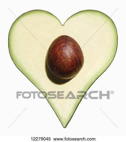 Avocado cut into the shape of a heart on a white background; Montreal, Quebec, Canada View Large Photo Image Stock Photography - Avocado cut into the shape of a heart on a white background; Montreal, Quebec, Canada. Fotosearch