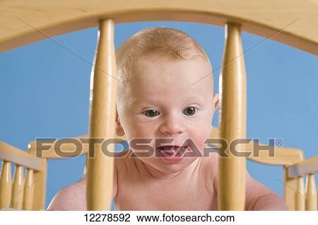 Baby on a changing table; Portland, Oregon, United States of America View Large Photo Image Stock Image - Baby on a changing table; Portland, Oregon, United States of America. Fotosearch