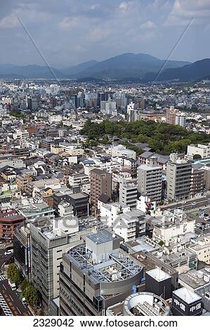 Cityscape With Clouds And Mountains In The Background; Kyoto, Japan View Large Photo Image Stock Image - Cityscape With Clouds And Mountains In The Background; Kyoto, Japan. Fotosearch
