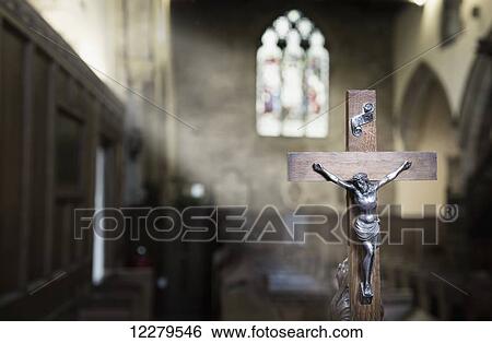 Stock Photograph - Close up of a crucifix inside a church, Richmondshire; North Yorkshire, England. Fotosearch