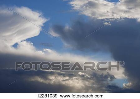 Clouds at sunset; Waterloo, Quebec, Canada View Large Photo Image Stock Photo - Clouds at sunset; Waterloo, Quebec, Canada. Fotosearch