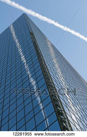Condensation trail in the blue sky is reflected on skyscraper; Toronto, Ontario, Canada View Large Photo Image Stock Photography - Condensation trail in the blue sky is reflected on skyscraper; Toronto, Ontario, Canada. Fotosearch