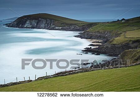 Stock Image - Coumeenole beach on the Slea Head drive on the Dingle Peninsula, Wild Atlantic Way; County Kerry, Ireland. Fotosearch