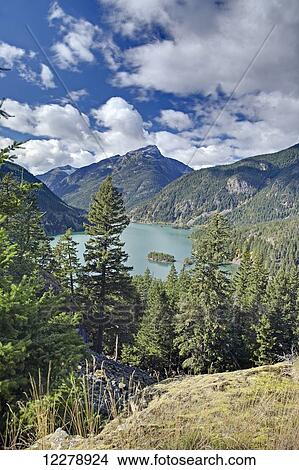 Diablo Lake, a reservoir in the North Cascade mountains of Northern Washington state; Washington, United States of America View Large Photo Image Picture - Diablo Lake, a reservoir in the North Cascade mountains of Northern Washington state; Washington, United States of America. Fotosearch