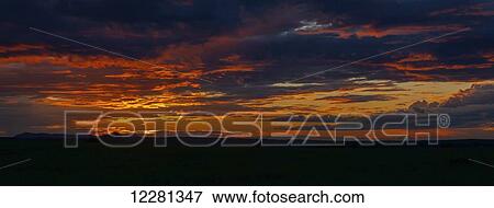 Dramatic clouds at sunset; Waterloo, Quebec, Canada View Large Photo Image Stock Photo - Dramatic clouds at sunset; Waterloo, Quebec, Canada. Fotosearch