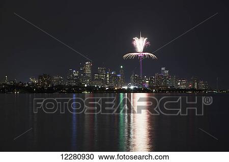 Fireworks display that forms the finale of the Closing Ceremonies for the Toronto 2015 Pan Am Games lights up the skyline; Toronto, Ontario, Canada View Large Photo Image Stock Image - Fireworks display that forms the finale of the Closing Ceremonies for the Toronto 2015 Pan Am Games lights up the skyline; Toronto, Ontario, Canada. Fotosearch