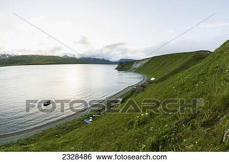 Fish Camp At The Westernmost End Of The Alaska Peninsula On The Edge Of Isanotski Strait; False Pass, Southwest Alaska, United States Of America View Large Photo Image Stock Photograph - Fish Camp At The Westernmost End Of The Alaska Peninsula On The Edge Of Isanotski Strait; False Pass, Southwest Alaska, United States Of America. Fotosearch