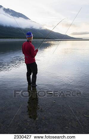 Fishing For Silver Salmon In Hallo Bay, Katmai Naional Park, Alaska Peninsula; Southwest Alaska, United States Of America View Large Photo Image Stock Photo - Fishing For Silver Salmon In Hallo Bay, Katmai Naional Park, Alaska Peninsula; Southwest Alaska, United States Of America. Fotosearch