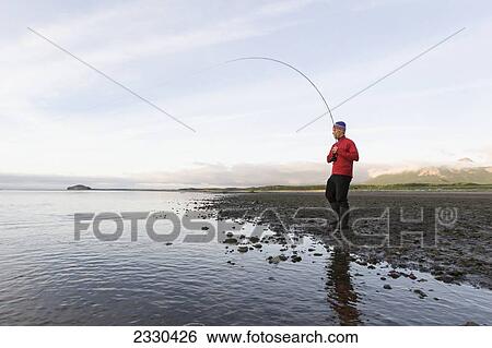 Fishing For Silver Salmon In Hallo Bay, Katmai Naional Park, Alaska Peninsula; Southwest Alaska, United States Of America View Large Photo Image Stock Photograph - Fishing For Silver Salmon In Hallo Bay, Katmai Naional Park, Alaska Peninsula; Southwest Alaska, United States Of America. Fotosearch