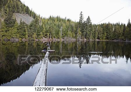 Fly fishing at Loggers Lake; Whistler, British Columbia, Canada View Large Photo Image Stock Photo - Fly fishing at Loggers Lake; Whistler, British Columbia, Canada. Fotosearch