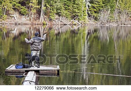 Stock Photograph - Fly fishing at Loggers Lake; Whistler, British Columbia, Canada. Fotosearch