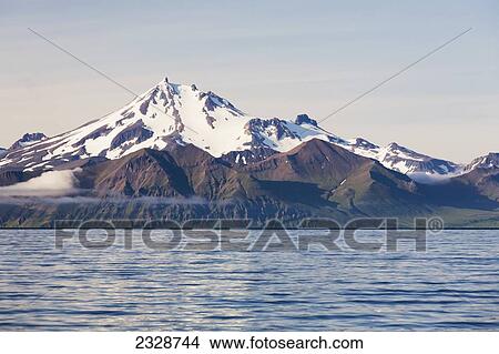 Frosty Peak Volcano On The Alaska Peninsula In Summertime; Southwest Alaska, United States Of America View Large Photo Image Picture - Frosty Peak Volcano On The Alaska Peninsula In Summertime; Southwest Alaska, United States Of America. Fotosearch