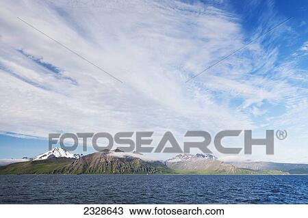 Frosty Volcano And The Alaska Peninsula In The Summer; Southwest Alaska, United States Of America View Large Photo Image Stock Image - Frosty Volcano And The Alaska Peninsula In The Summer; Southwest Alaska, United States Of America. Fotosearch