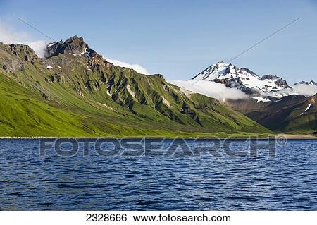 Frosty Volcano Near Cold Bay On The Alaska Peninsula In Summertime; Southwest Alaska, United States Of America View Large Photo Image Stock Photograph - Frosty Volcano Near Cold Bay On The Alaska Peninsula In Summertime; Southwest Alaska, United States Of America. Fotosearch