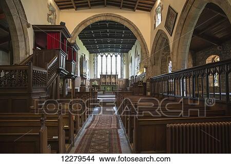 Interior of a church with wooden pews, Richmondshire District; North Yorkshire, England View Large Photo Image Picture - Interior of a church with wooden pews, Richmondshire District; North Yorkshire, England. Fotosearch