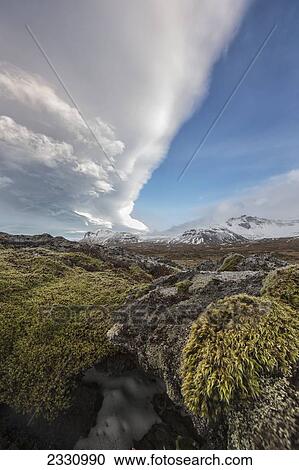 Stock Image - Lenticular Clouds Above The Volcanic Landscape Of Iceland, On The Snaefellsnes Peninsula; Iceland. Fotosearch
