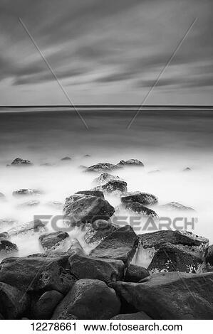 Long exposure of the surf along Wailua Beach processed in high contrast black and white; Wailua, Kauai, Hawaii, United States of America View Large Photo Image Stock Image - Long exposure of the surf along Wailua Beach processed in high contrast black and white; Wailua, Kauai, Hawaii, United States of America. Fotosearch