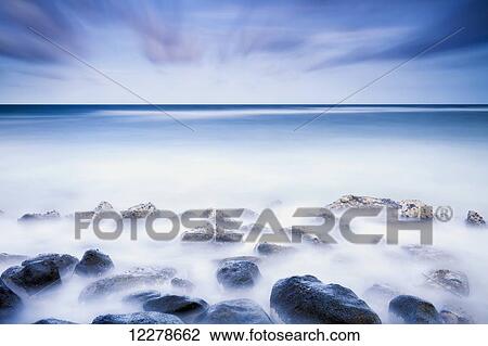 Long exposure of the surf along Wailua Beach; Wailua, Kauai, Hawaii, United States of America View Large Photo Image Stock Image - Long exposure of the surf along Wailua Beach; Wailua, Kauai, Hawaii, United States of America. Fotosearch