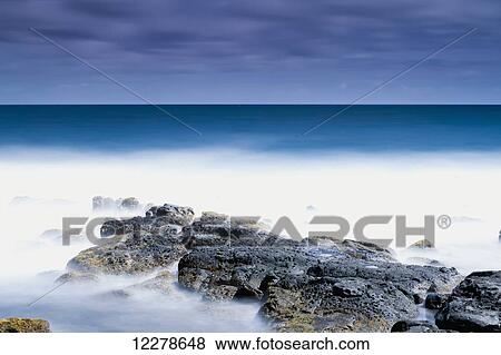 Long exposure surf at the Ahukini State Park; Lydgate, Kauai, Hawaii, United States of America View Large Photo Image Stock Photo - Long exposure surf at the Ahukini State Park; Lydgate, Kauai, Hawaii, United States of America. Fotosearch